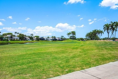 From the moment you walk in, you're greeted with volume ceilings on Indian Spring Golf and Country Club in Florida - for sale on GolfHomes.com, golf home, golf lot