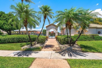 From the moment you walk in, you're greeted with volume ceilings on Indian Spring Golf and Country Club in Florida - for sale on GolfHomes.com, golf home, golf lot