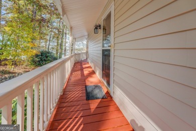 Panoramic big water views from this charming DEEDED lakefront on Turtle Cove Golf Course in Georgia - for sale on GolfHomes.com, golf home, golf lot