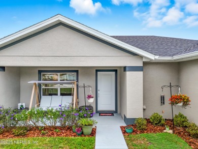 LIKE NEW! Welcome to this beautifully maintained 3-bedroom on The Grand Club Cypress Course in Florida - for sale on GolfHomes.com, golf home, golf lot