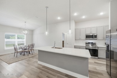 LIKE NEW! Welcome to this beautifully maintained 3-bedroom on The Grand Club Cypress Course in Florida - for sale on GolfHomes.com, golf home, golf lot