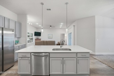 LIKE NEW! Welcome to this beautifully maintained 3-bedroom on The Grand Club Cypress Course in Florida - for sale on GolfHomes.com, golf home, golf lot