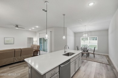 LIKE NEW! Welcome to this beautifully maintained 3-bedroom on The Grand Club Cypress Course in Florida - for sale on GolfHomes.com, golf home, golf lot