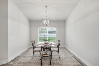 LIKE NEW! Welcome to this beautifully maintained 3-bedroom on The Grand Club Cypress Course in Florida - for sale on GolfHomes.com, golf home, golf lot