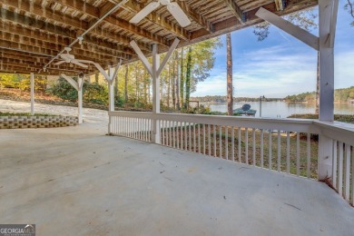 Panoramic big water views from this charming DEEDED lakefront on Turtle Cove Golf Course in Georgia - for sale on GolfHomes.com, golf home, golf lot