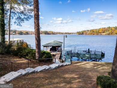 Panoramic big water views from this charming DEEDED lakefront on Turtle Cove Golf Course in Georgia - for sale on GolfHomes.com, golf home, golf lot