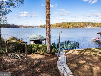 Panoramic big water views from this charming DEEDED lakefront on Turtle Cove Golf Course in Georgia - for sale on GolfHomes.com, golf home, golf lot