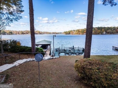 Panoramic big water views from this charming DEEDED lakefront on Turtle Cove Golf Course in Georgia - for sale on GolfHomes.com, golf home, golf lot