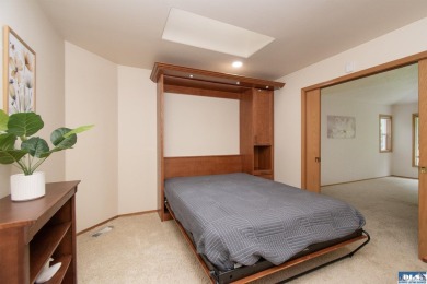Discover refined living in this spacious 2-bedroom, 2-bath on SunLand Golf and Country Club in Washington - for sale on GolfHomes.com, golf home, golf lot