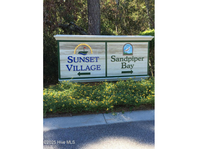 COMPLETELY REMODELLED 10/1/2025,,,This charming condo with on Sandpiper Bay Golf and Country Club in North Carolina - for sale on GolfHomes.com, golf home, golf lot