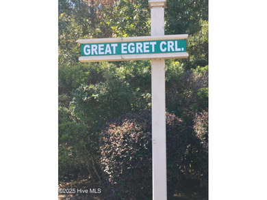 COMPLETELY REMODELLED 10/1/2025,,,This charming condo with on Sandpiper Bay Golf and Country Club in North Carolina - for sale on GolfHomes.com, golf home, golf lot