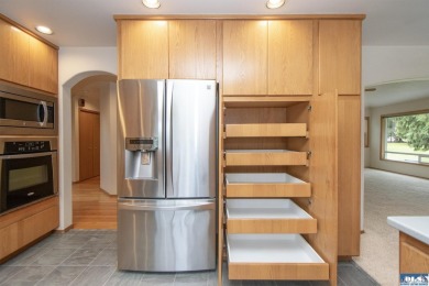 Discover refined living in this spacious 2-bedroom, 2-bath on SunLand Golf and Country Club in Washington - for sale on GolfHomes.com, golf home, golf lot