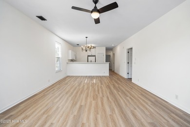 COMPLETELY REMODELLED 10/1/2025,,,This charming condo with on Sandpiper Bay Golf and Country Club in North Carolina - for sale on GolfHomes.com, golf home, golf lot