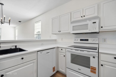 COMPLETELY REMODELLED 10/1/2025,,,This charming condo with on Sandpiper Bay Golf and Country Club in North Carolina - for sale on GolfHomes.com, golf home, golf lot