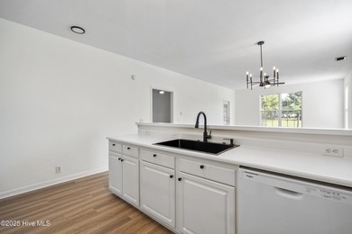 COMPLETELY REMODELLED 10/1/2025,,,This charming condo with on Sandpiper Bay Golf and Country Club in North Carolina - for sale on GolfHomes.com, golf home, golf lot