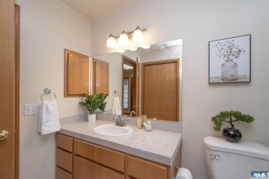Discover refined living in this spacious 2-bedroom, 2-bath on SunLand Golf and Country Club in Washington - for sale on GolfHomes.com, golf home, golf lot