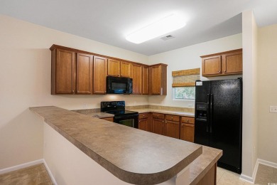 This is a beautifully maintained 2-bedroom, 2-bathroom condo on Barefoot Resort and Golf Club  in South Carolina - for sale on GolfHomes.com, golf home, golf lot