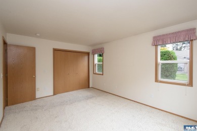 Discover refined living in this spacious 2-bedroom, 2-bath on SunLand Golf and Country Club in Washington - for sale on GolfHomes.com, golf home, golf lot