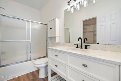 TASTEFULLY REMODELLED 10/1/2025,,,This charming condo with on Sandpiper Bay Golf and Country Club in North Carolina - for sale on GolfHomes.com, golf home, golf lot