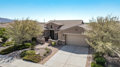 Luxury meets tranquility in this stunning David Weekley home on Estrella Mountain Ranch Golf Course in Arizona - for sale on GolfHomes.com, golf home, golf lot