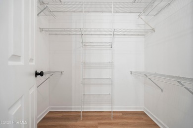 TASTEFULLY REMODELLED 10/1/2025,,,This charming condo with on Sandpiper Bay Golf and Country Club in North Carolina - for sale on GolfHomes.com, golf home, golf lot