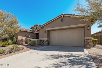 Luxury meets tranquility in this stunning David Weekley home on Estrella Mountain Ranch Golf Course in Arizona - for sale on GolfHomes.com, golf home, golf lot