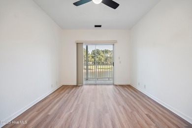 TASTEFULLY REMODELLED 10/1/2025,,,This charming condo with on Sandpiper Bay Golf and Country Club in North Carolina - for sale on GolfHomes.com, golf home, golf lot