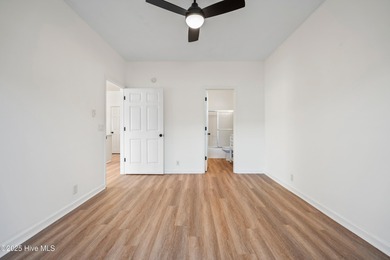 TASTEFULLY REMODELLED 10/1/2025,,,This charming condo with on Sandpiper Bay Golf and Country Club in North Carolina - for sale on GolfHomes.com, golf home, golf lot