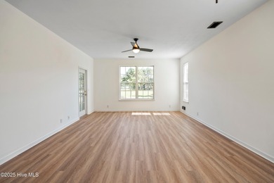 TASTEFULLY REMODELLED 10/1/2025,,,This charming condo with on Sandpiper Bay Golf and Country Club in North Carolina - for sale on GolfHomes.com, golf home, golf lot