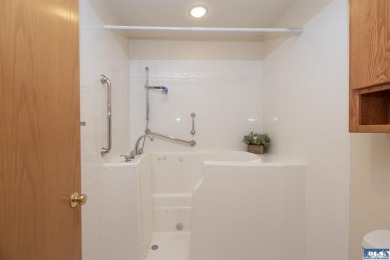 Discover refined living in this spacious 2-bedroom, 2-bath on SunLand Golf and Country Club in Washington - for sale on GolfHomes.com, golf home, golf lot