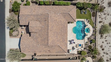 Luxury meets tranquility in this stunning David Weekley home on Estrella Mountain Ranch Golf Course in Arizona - for sale on GolfHomes.com, golf home, golf lot