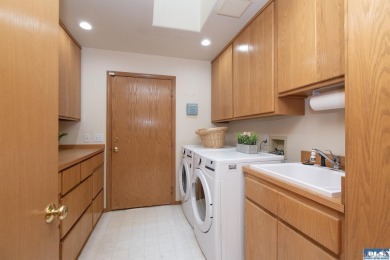 Discover refined living in this spacious 2-bedroom, 2-bath on SunLand Golf and Country Club in Washington - for sale on GolfHomes.com, golf home, golf lot