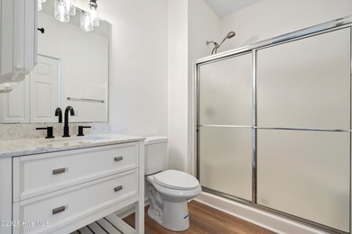 TASTEFULLY REMODELLED 10/1/2025,,,This charming condo with on Sandpiper Bay Golf and Country Club in North Carolina - for sale on GolfHomes.com, golf home, golf lot