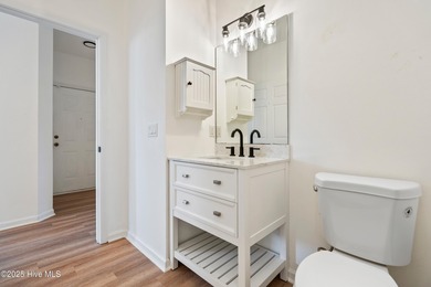 TASTEFULLY REMODELLED 10/1/2025,,,This charming condo with on Sandpiper Bay Golf and Country Club in North Carolina - for sale on GolfHomes.com, golf home, golf lot