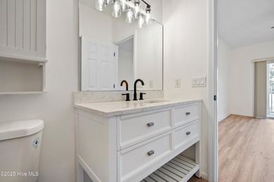 TASTEFULLY REMODELLED 10/1/2025,,,This charming condo with on Sandpiper Bay Golf and Country Club in North Carolina - for sale on GolfHomes.com, golf home, golf lot