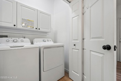 TASTEFULLY REMODELLED 10/1/2025,,,This charming condo with on Sandpiper Bay Golf and Country Club in North Carolina - for sale on GolfHomes.com, golf home, golf lot