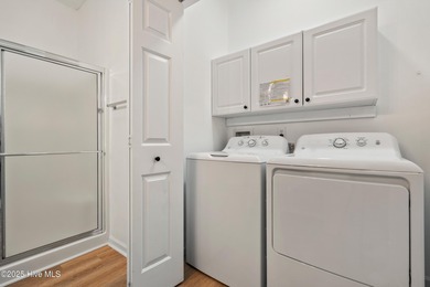 TASTEFULLY REMODELLED 10/1/2025,,,This charming condo with on Sandpiper Bay Golf and Country Club in North Carolina - for sale on GolfHomes.com, golf home, golf lot