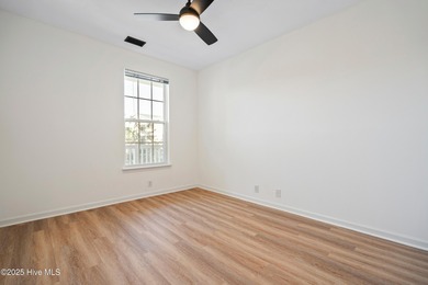 TASTEFULLY REMODELLED 10/1/2025,,,This charming condo with on Sandpiper Bay Golf and Country Club in North Carolina - for sale on GolfHomes.com, golf home, golf lot