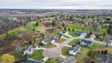 Nestled in the desirable Golden Sands Golf Course, this home on Golden Sands Golf Community in Wisconsin - for sale on GolfHomes.com, golf home, golf lot