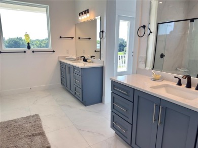 Welcome to 279 Yacht Harbor Drive, a custom-built single-family on Hammock Dunes Club in Florida - for sale on GolfHomes.com, golf home, golf lot