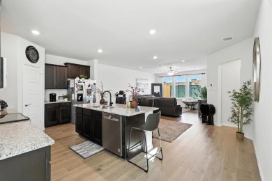 Welcome Home to this stunning 2024-built townhome located in the on Hurricane Creek Country Club in Texas - for sale on GolfHomes.com, golf home, golf lot