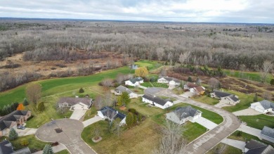 Nestled in the desirable Golden Sands Golf Course, this home on Golden Sands Golf Community in Wisconsin - for sale on GolfHomes.com, golf home, golf lot