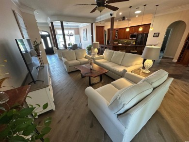 Experience luxury living in this recently updated home on Barefoot Resort and Golf Club  in South Carolina - for sale on GolfHomes.com, golf home, golf lot
