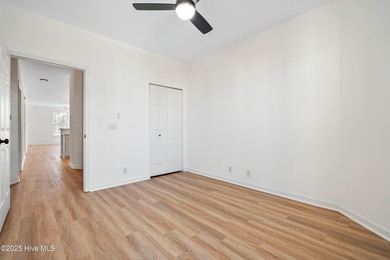 TASTEFULLY REMODELLED 10/1/2025,,,This charming condo with on Sandpiper Bay Golf and Country Club in North Carolina - for sale on GolfHomes.com, golf home, golf lot