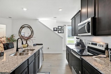 Welcome Home to this stunning 2024-built townhome located in the on Hurricane Creek Country Club in Texas - for sale on GolfHomes.com, golf home, golf lot