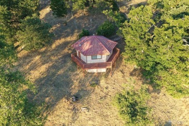 Find serenity in this first time on the market rustic ranch on Oak Tree Country Club in California - for sale on GolfHomes.com, golf home, golf lot