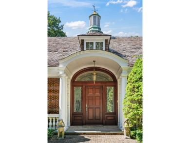 ROSLYN HARBOR; Timeless Brick Manor: Behind iron gates and a on Engineers Country Club in New York - for sale on GolfHomes.com, golf home, golf lot
