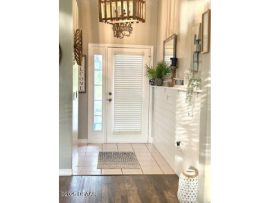 Lovely home with a decorator's touch in a great family on LPGA International Golf Course in Florida - for sale on GolfHomes.com, golf home, golf lot