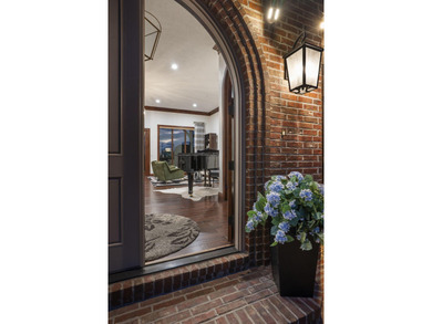 Situated within the prestigious, gated community of Highland on Highland Springs Country Club in Missouri - for sale on GolfHomes.com, golf home, golf lot