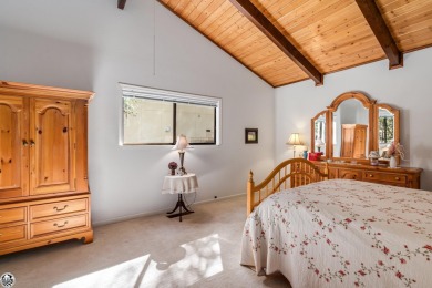 Relax and stay in this charming 3-bedroom, 2-bath cabin nestled on Pine Mountain Lake Country Club in California - for sale on GolfHomes.com, golf home, golf lot